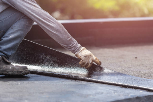 Professional Basement Waterproofing technician working in Briggsville, WI